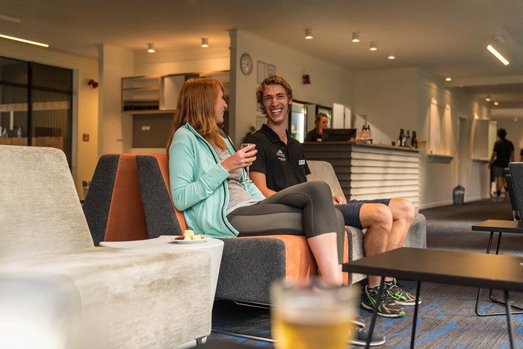 relaxing in the lodge on the Milford Track guided walk