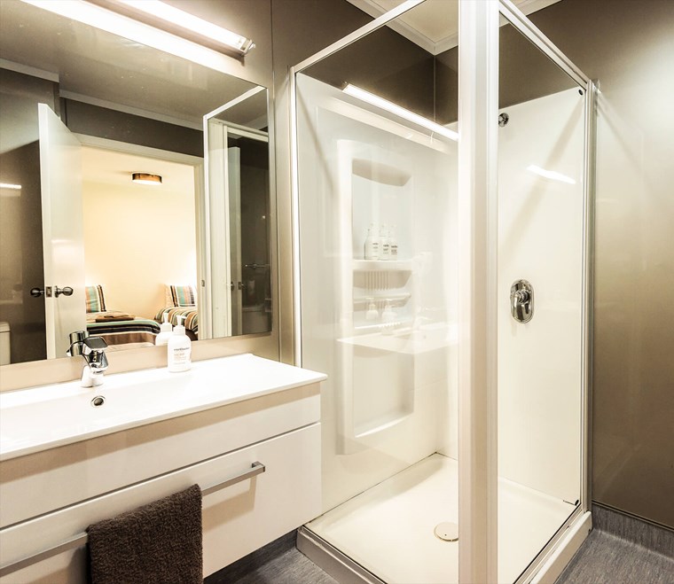 Ensuite bathrooms in private rooms on the Milford Track guided walk